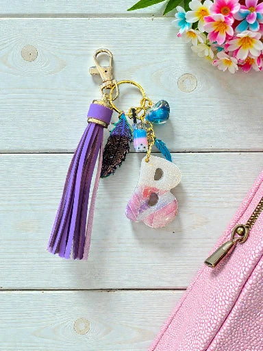 B Feather Pastel